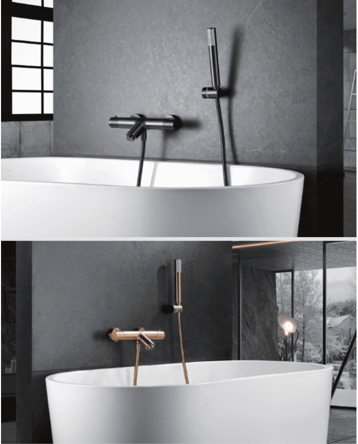 Mitigeur bain douche Genova Imex en finition cuivrée avec douchette, monté sur baignoire vintage blanche.