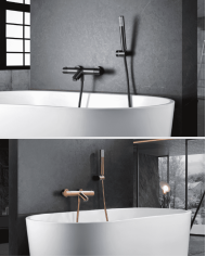 Mitigeur bain douche Genova Imex en finition cuivrée avec douchette, monté sur baignoire vintage blanche.